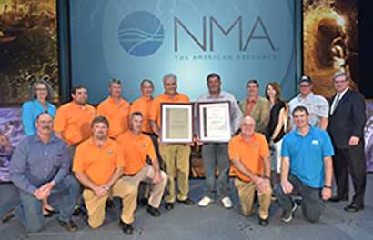 Dr. Jessica Kogel of NIOSH and Hal Quinn, president of the National Mining Association, present the 2016 Mine Safety and Health Technology Innovations Award for metal/nonmetal to Small Mine Development, LLC., and JH Fletcher.